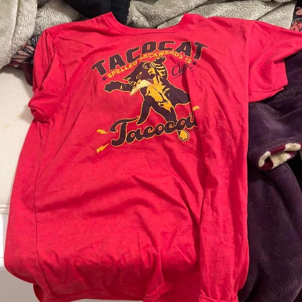 This is from Chuy’s which is a restaurant in Oklahoma and is red and a medium.